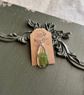 Queen Anne's Lace leaf teardrop resin pendant necklace on silver-tone chain displayed on Stone & Stem Jewelry card